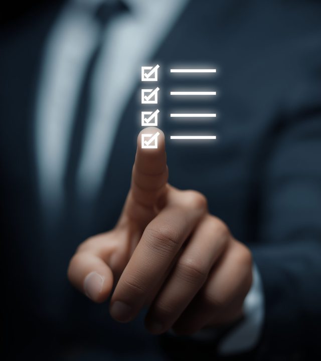 man suit interacting with digital checklist